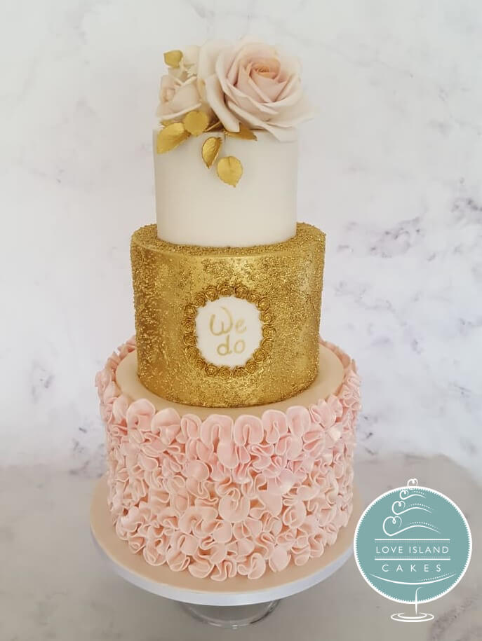 Tall 'We Do' gold sparkle with pink frills and roses