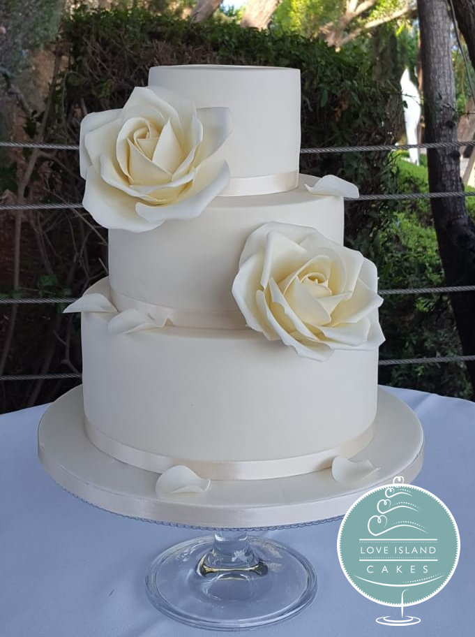 Three tier with ivory sugar roses
