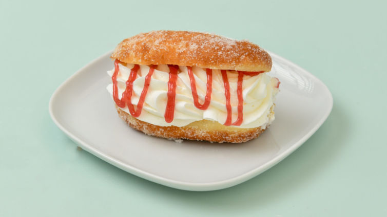 Fresh cream and raspberry jam doughnut